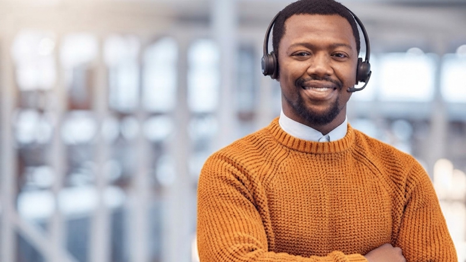 Traction Outsourcing 24-hour client support agent wearing a headset