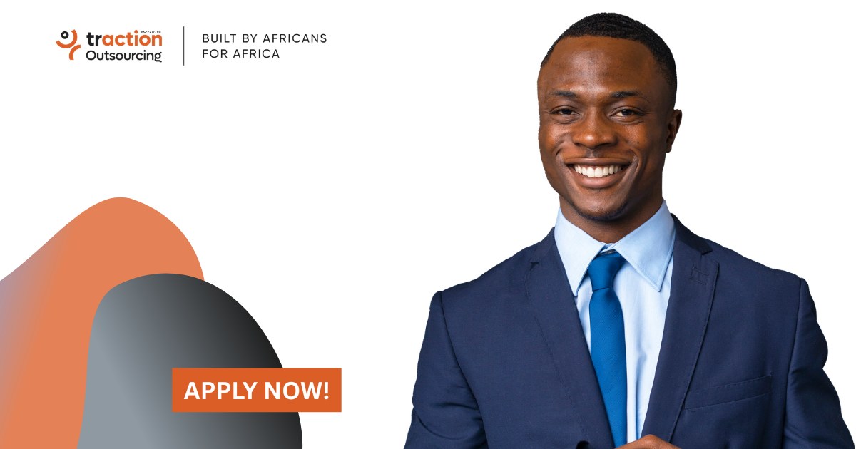 Smiling man in a navy suit and blue tie beside the Traction Outsourcing logo and an Apply Now button, for the Accountant job